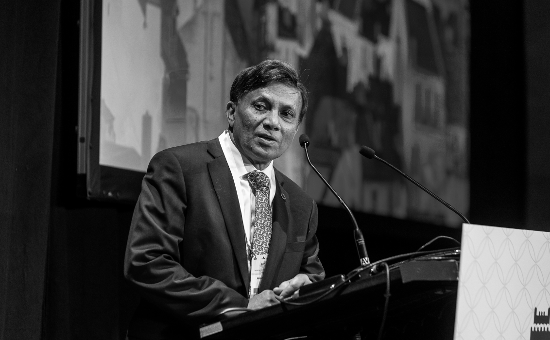 Prof Akhtar Hussain giving a speech on stage